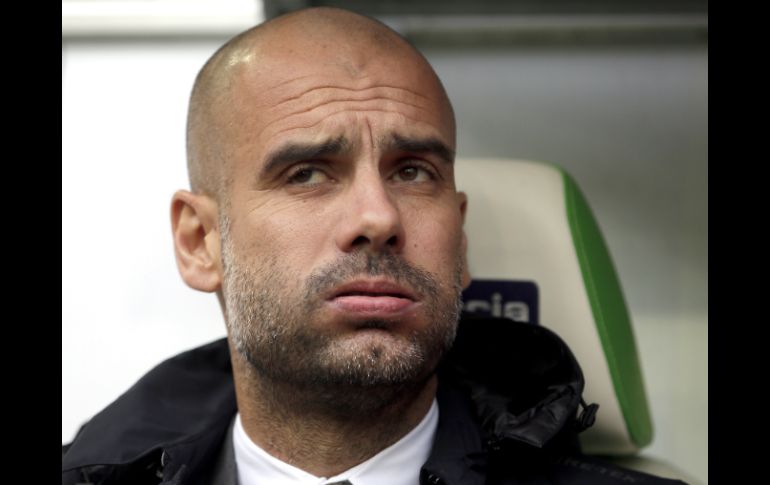 ''No hablando de Joe, sino de todos los jugadores en la escuadra, quiero vivir y trabajar con los que quieren quedarse'', advierte Pep. AP / ARCHIVO