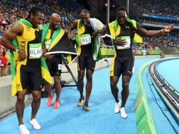 Con el cuarteto formado por Asafa Powell, Yohan Blake, Nickel Ashmeade y Bolt, Jamaica ganó con un tiempo de 37.27. AFP / F. Fife