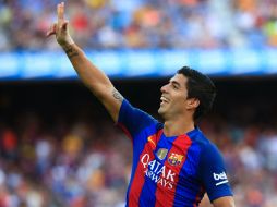 Luis Suárez se divirtió con el primer ''hat-trick'' del torneo, seguido de un doblete de Messi y un gol más del turco Arda Turan. AFP / P. Barrena