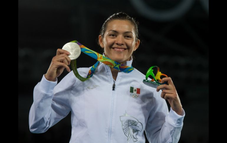 ''Encontrar este sueño de tres Juegos Olímpicos con medalla en cada uno de ellos, lo estoy viviendo y disfrutando, expresó. MEXSPORT / ARCHIVO