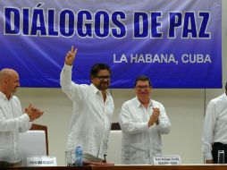 El Estado colombiano y las FARC rubricaron este miércoles el acuerdo final que cierra sus diálogos de paz. AFP / ARCHIVO