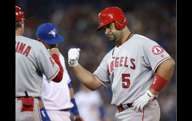 Albert pujols. El dominicano consiguió esta nueva marca después de igualar el décimo puesto de todos los tiempos en jonrones. AFP / T. Szczerbowski