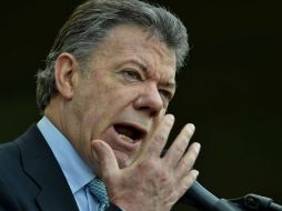 Santos admite que el proceso de negociación ha sido difícil; pese a ello, el acuerdo cambiará la historia de Colombia. AP / ARCHIVO