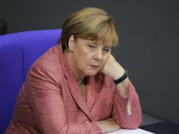 Analistas aseguran que, pese a la derrota del domingo, el régimen de Ángela Merkel no está realmente amenazado. AP / M. Schreiber