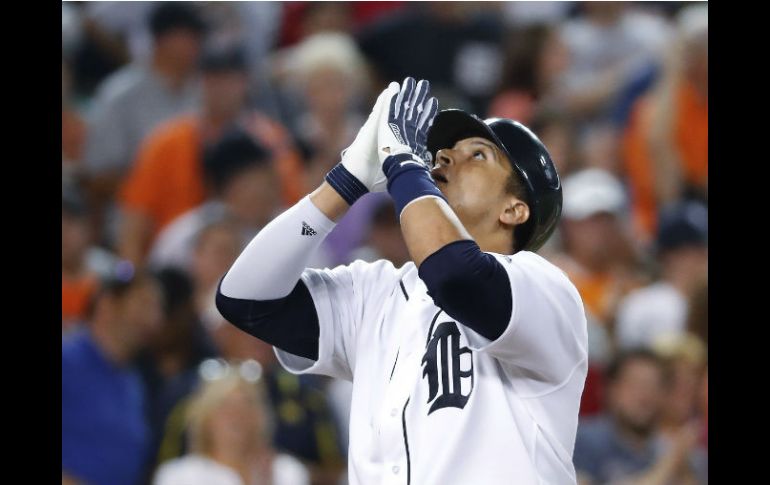 El venezolano Víctor Martínez logró la carrera del empate. AP / P. Sancya