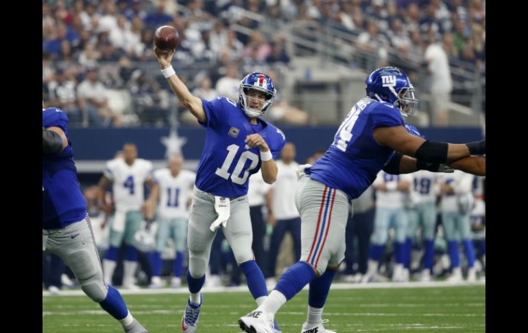 Eli Manning lanzó tres pases de touchdown. AP / M. Ainsworth