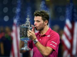 Wawrinka, de 31 años, consiguió el tercer título de Grand Slam de su carrera. AFP / J. Samad