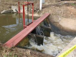 En las aguas de la presa junto a la compuerta estaba el cuerpo del menor de cuatro años. ESPECIAL /