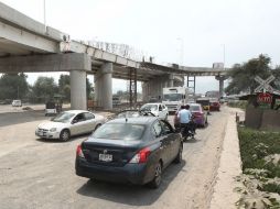 Automovilistas padecen el tráfico que se forma en horarios pico en el cruce de avenida Concepción y Camino Unión del Cuatro. EL INFORMADOR / E. Barrera