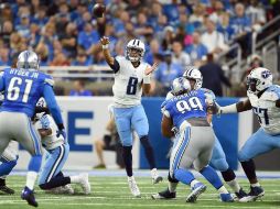 Mariota lanzó dos pases de anotación en el cuarto periodo, luego de que Tennessee quedó en desventaja por 15-3. AFP / S. Revere