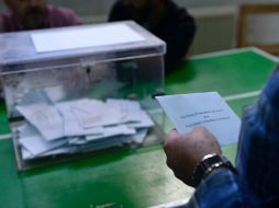 El partido conservador seguiría gobernando, en base a los primeros resultados tras cierre de urnas. AFP / M. Riopa