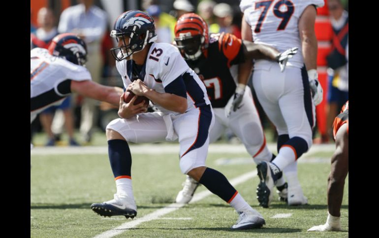 Trevor Siemian impuso una marca en su carrera al lanzar cuatro pases para touchdown. AP /  G. Landers