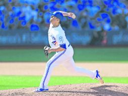 Roberto Osuna. El pitcher mexicano logró su tercera victoria de la campaña. AFP /