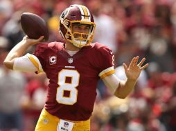 Kirk Cousins lanzó tres pases de touchdown, entre ellos dos al tight end Jordan Reed. AFP /  P. Smith