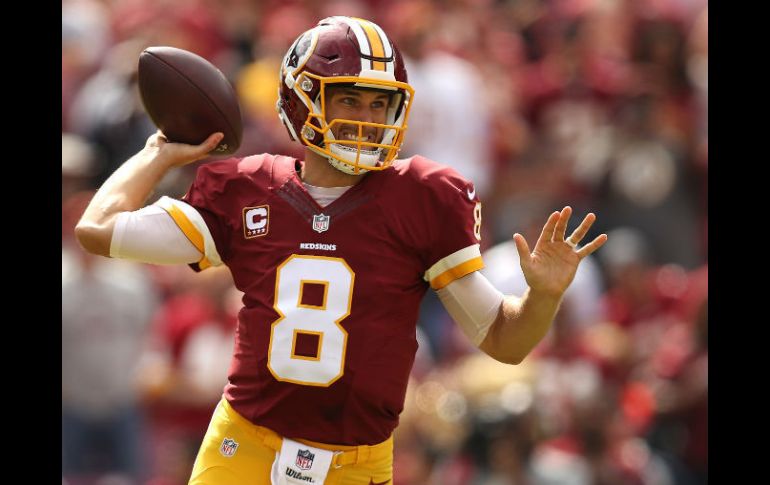 Kirk Cousins lanzó tres pases de touchdown, entre ellos dos al tight end Jordan Reed. AFP /  P. Smith