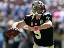 Drew Brees llevó a los Santos a un sorprendente triunfo. AFP / S. Haffey