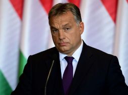 El primer ministro Viktor Orban dice que la prohibición se aplicará a futuros planes de reubicación, no a los que están en marcha. AFP / A. Kisbenedek