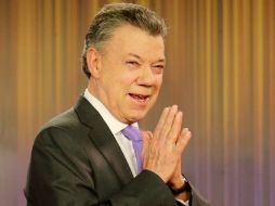 Juan Manuel Santos asegura que recibe la honrosa distinción, no a nombre suyo, sino de todos los colombianos. EFE / L. Muñoz