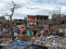 La mayoría de las muertes ocurrieron cerca de la costa sur, con decesos provocados por la caída de árboles, escombros y ríos crecidos. AFP / ARCHIVO