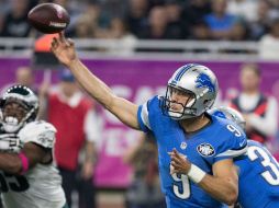 Matthew Stafford preparó la escena para el gol de campo definitivo, al convertir en tercera y cuatro desde la 39. AFP / D. Reginek