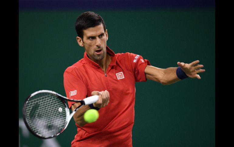 Djokovic, defensor del título, jugará los octavos de final ante el vencedor del partido entre el Grigor Dimitrov y Vasek Pospisil. AFP / J. Eisele