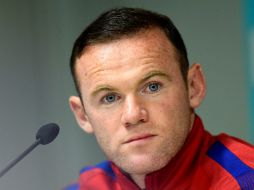 ''Siento que aún tengo mucho que ofrecer y lo he dejado claro, al menos hasta el Mundial de Rusia'', dijo Rooney. AFP / J. Klamar