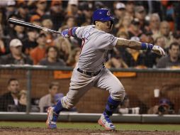 Javier Báez batea sencillo en la novena para poner a los Cachorros en la antesala de la Serie Mundial. AP / M. Sánchez