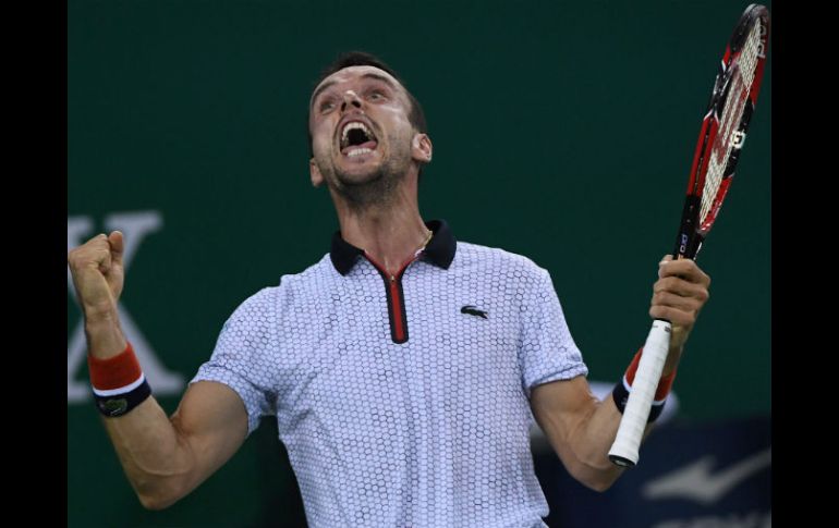 Roberto Bautista celebra tras saberse clasificado a la final. AFP / W. Zhao