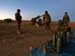 Soldados ultiman los preparativos para la batalla tras un gran avance. AFP / S. Hamed