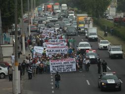 Los ejidatarios marcharon este miércoles como parte de sus protestas para exigir el pago por sus terrenos. EL INFORMADOR / F. Atilano