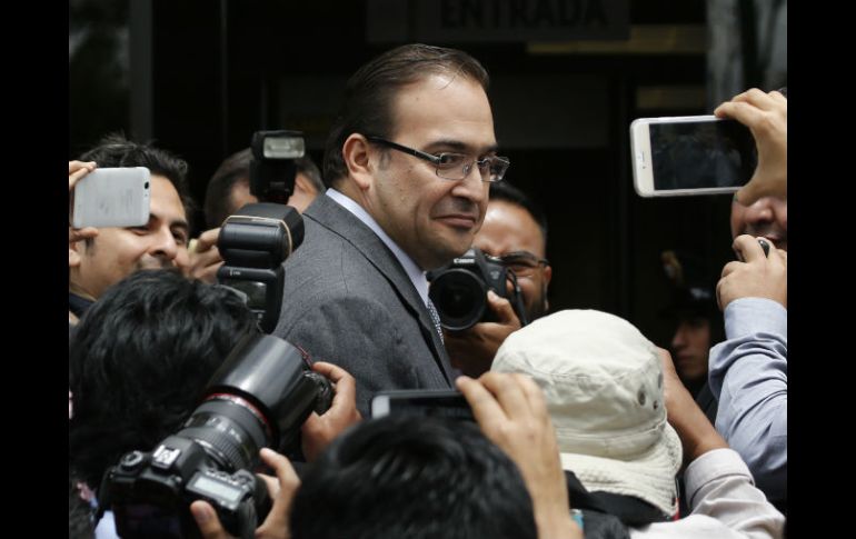 'No voy a huir, me quedo en Veracruz' para 'atender estas infamias, estas calumnias', dijo Javier Duarte de Ochoa. AP / M. Ugarte