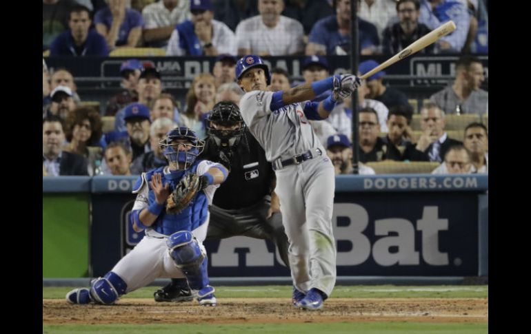 Adisson Russell conectó su segundo jonrón de la serie en el sexto inning. AP / J. Hong