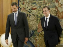 Rajoy acepta el encargo del rey Felipe VI para convocar a un nuevo gobierno y promete diálogo con partidos políticos. AFP / C. Moya