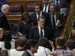 El sábado, Rajoy volverá a contar con los mismos votos favorables de hoy y la abstención anunciada por los socialistas. EFE / C. Moya