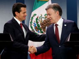 Santos hace este anuncio a los colombianos durante una conferencia conjunta con Peña Nieto, quien está en visita de Estado. EFE / L. Muñoz