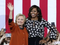 La participación de Michelle se ha vuelto una parte clave de los esfuerzos de Clinton por animar a votar a las mujeres de raza negra. AFP / A. Wong