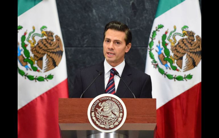 Enrique Peña Nieto señaló a Mariano Rajoy que México seguirá estando muy cerca de España. AFP / ARCHIVO