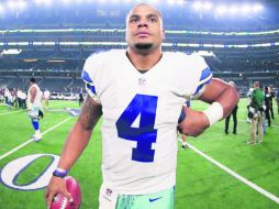 Dak Prescott. El quarterback de Dallas se encuentra en los cuernos de la Luna y se ve difícil que pueda perder ante Filadelfia. AP /