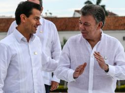 Durante su estancia en Bogotá, el jefe del Ejecutivo federal fue declarado huésped distinguido y recibió las llaves de la ciudad. AFP / ARCHIVO