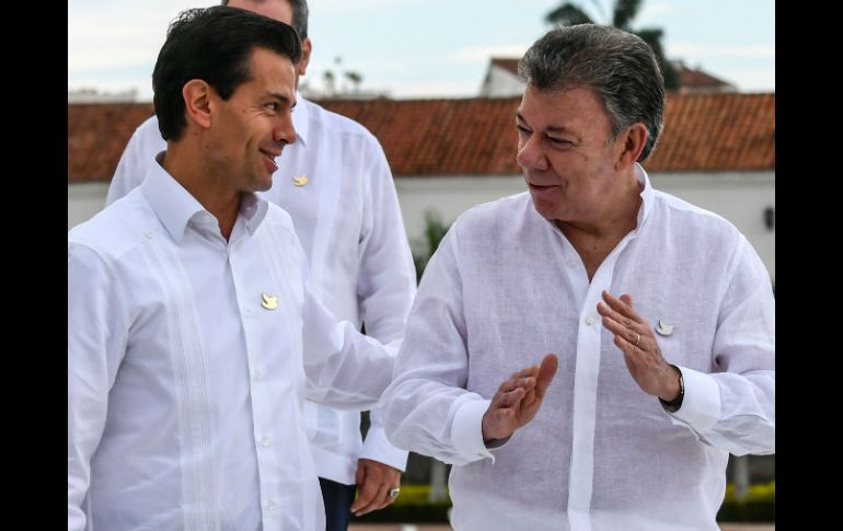 Durante su estancia en Bogotá, el jefe del Ejecutivo federal fue declarado huésped distinguido y recibió las llaves de la ciudad. AFP / ARCHIVO