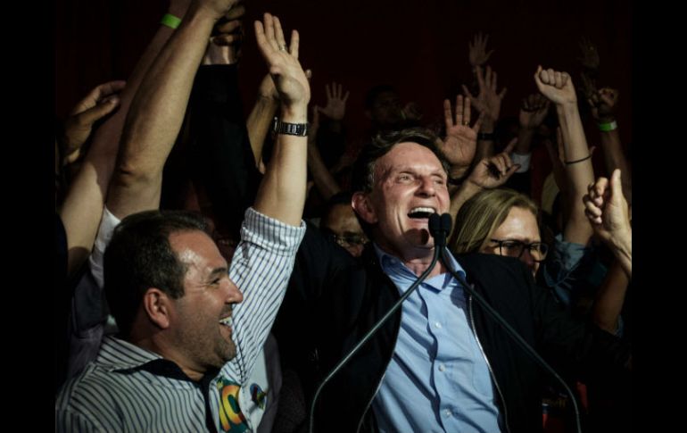 El pastor venció a su rival, Marcelo Freixo, por un amplio margen. AFP / Y. Chiba