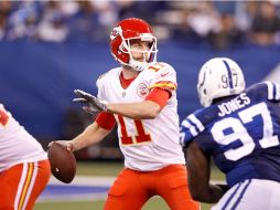 Alex Smith prepara un pase. AFP / J. Robbins