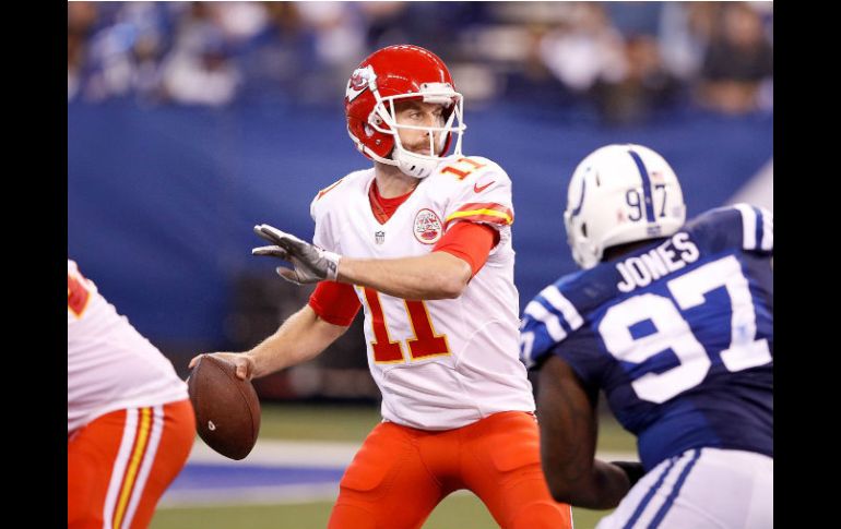 Alex Smith prepara un pase. AFP / J. Robbins