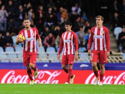 La derrota deja a los atléticos en tercera posición a tres puntos del líder Real Madrid. AFP / A. Gillenea