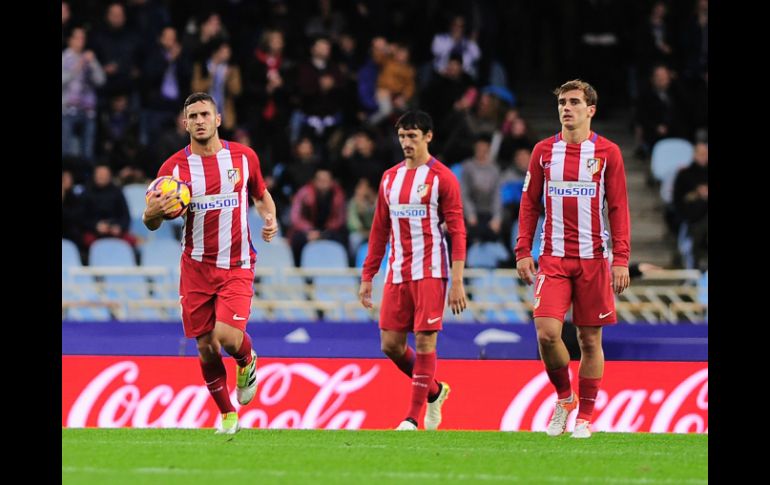 La derrota deja a los atléticos en tercera posición a tres puntos del líder Real Madrid. AFP / A. Gillenea