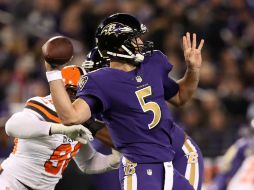 Joe Flacco lanzó para 296 yardas en 30 de 41 intentos. AFP / R. Carr