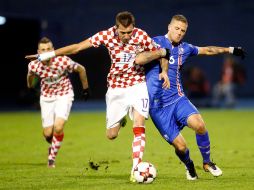 Brozovic celebra uno de sus dos goles de la noche. AP / D. Bandic