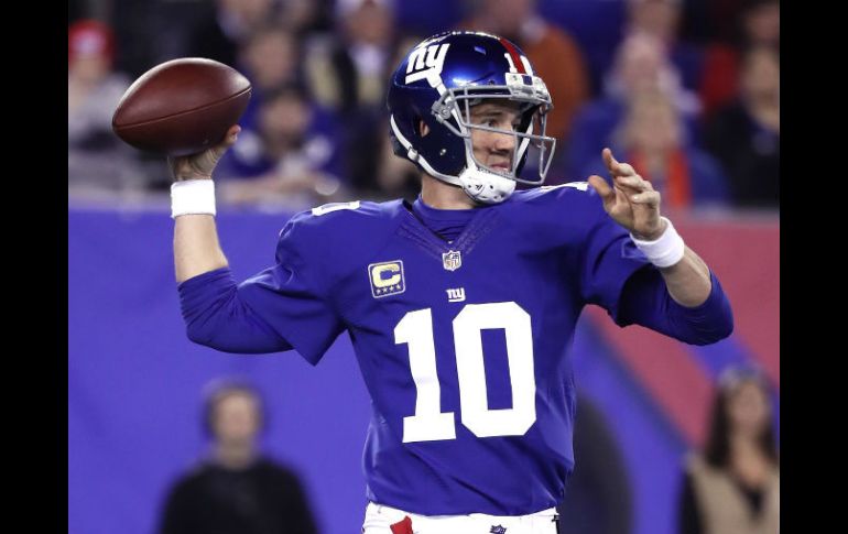 Manning conectó en las diagonales con el ala novato Jerrell Adams. AFP / A. Bello