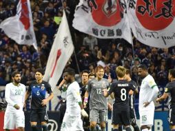 El equipo de Japón brindó múltiples emociones en el partido de la quinta jornada de tercera fase de la zona asiática. AFP / K. Nogi