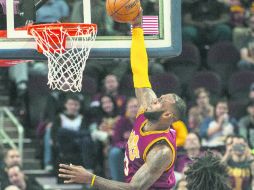 La figura. LeBron James se despachó con 28 puntos, nueve rebotes y 14 asistencias. AP /  P. Long